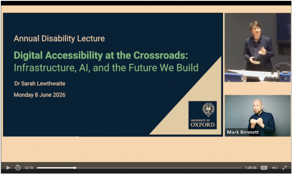 Screenshot of Sarah's presentation, with the title slide, and Sarah gesturing and a BSL interpreter, Mark Bennett, signing.